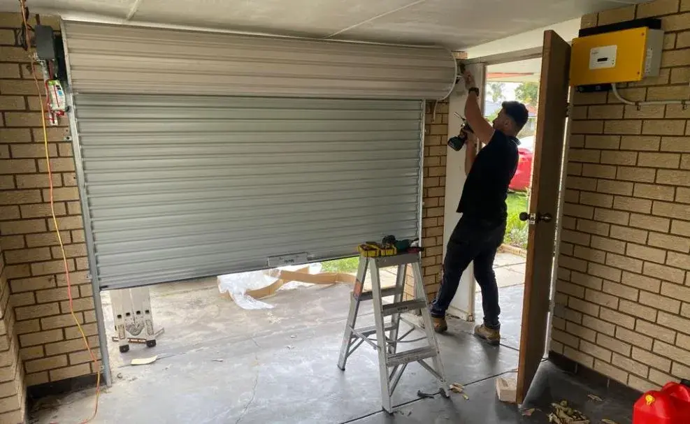Garage door installation by professional technician in Tarrant County